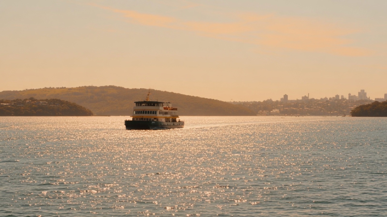 Ferry on Sydney Harbour with Opera House and bridge