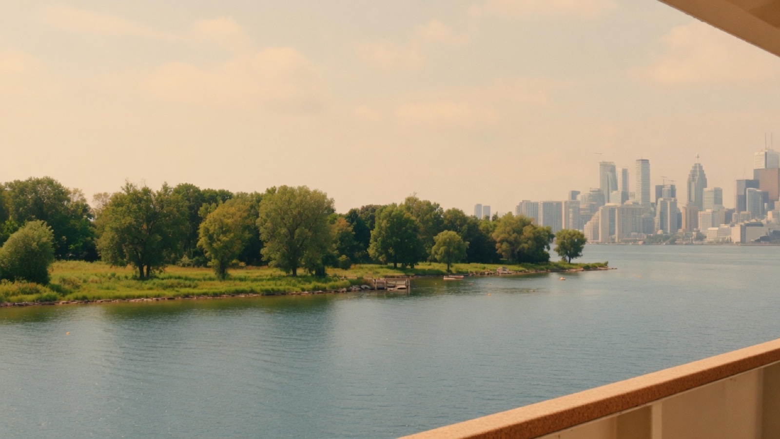 Ferry arriving at Toronto Islands with skyline behind